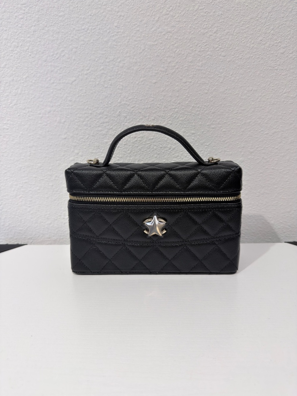 Quilted Black Top-Handle Vanity Bag